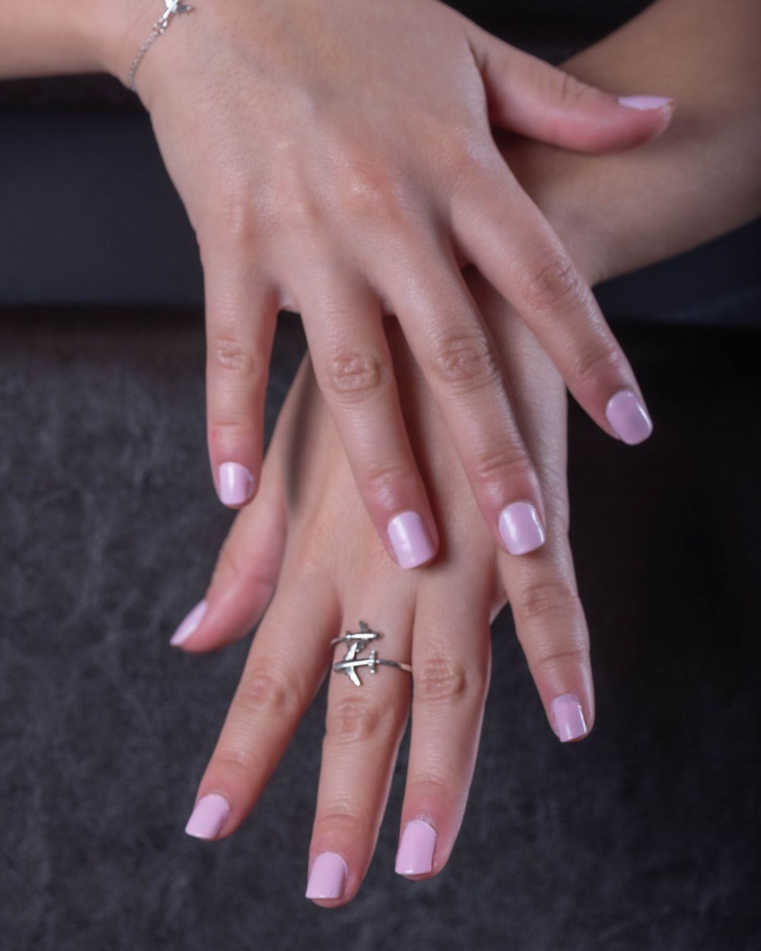 Silver Ring with Two Airplanes: A stylish companion for travelers, shown from a different angle to highlight its unique design.