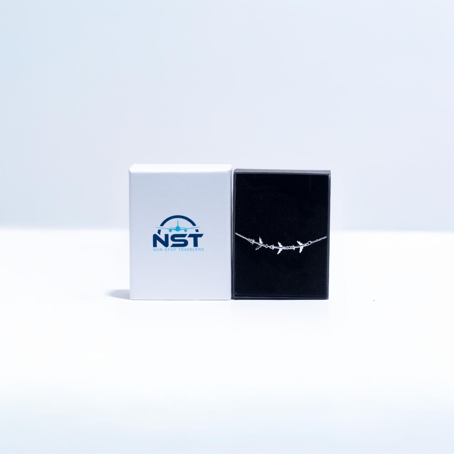 Bracelet with Three Airplanes: Thoughtfully packaged in a delicate box, ready to be gifted to the aviation enthusiast or traveler you care about.