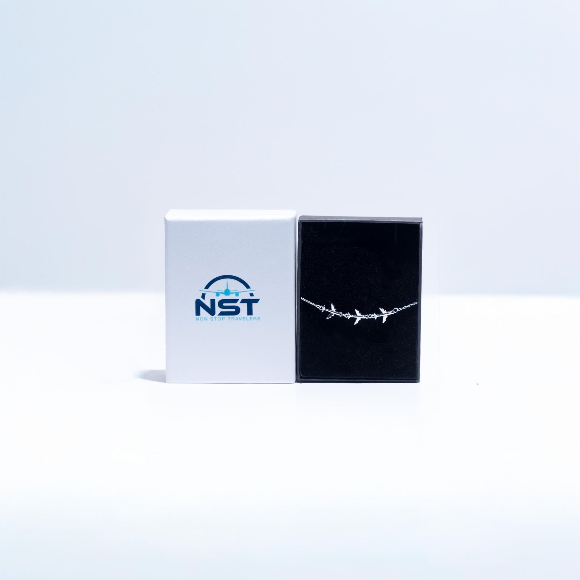 Bracelet with Three Airplanes: Thoughtfully packaged in a delicate box, ready to be gifted to the aviation enthusiast or traveler you care about.