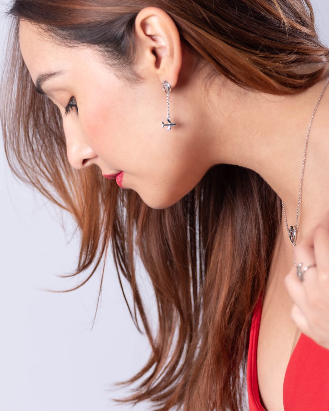 925 Sterling Silver Earring with Globe and Airplane: Featuring a delicate globe and a plane in motion, perfect for wanderlust-inspired looks