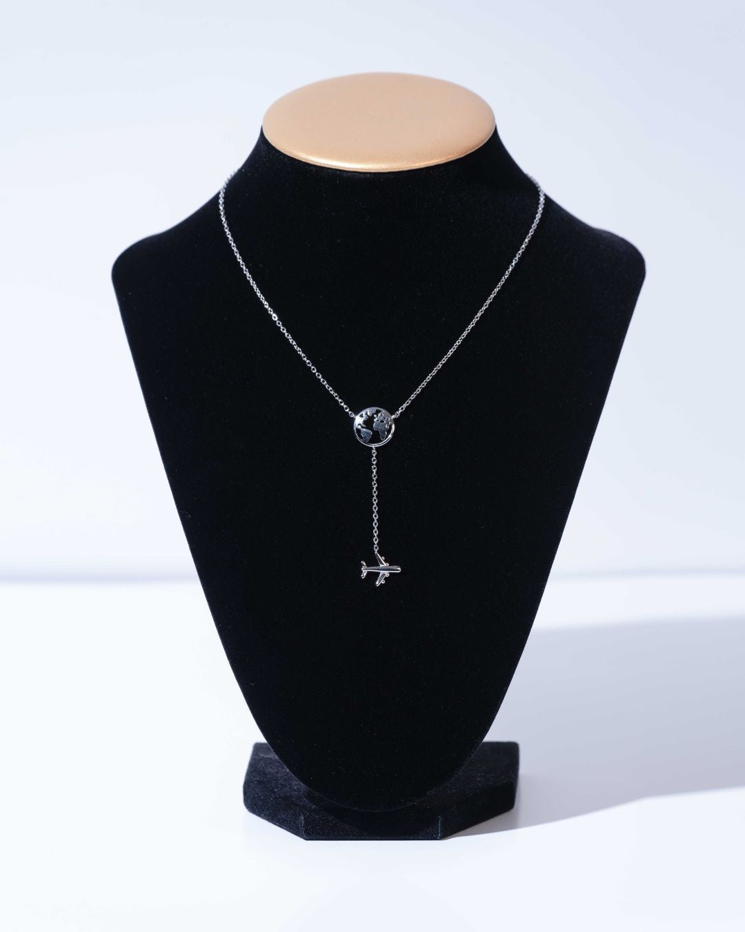 925 Sterling Silver Necklace with Globe and Airplane: A delicate yet bold accessory, crafted to celebrate your passion for exploring the world.