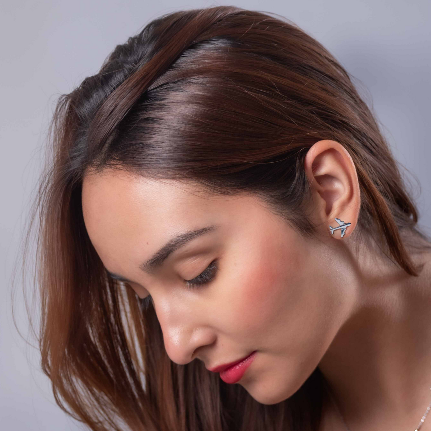 Sterling Silver Airplane Earring (13mm): A minimalist yet bold design, perfect for travelers who love to showcase their passion for aviation.